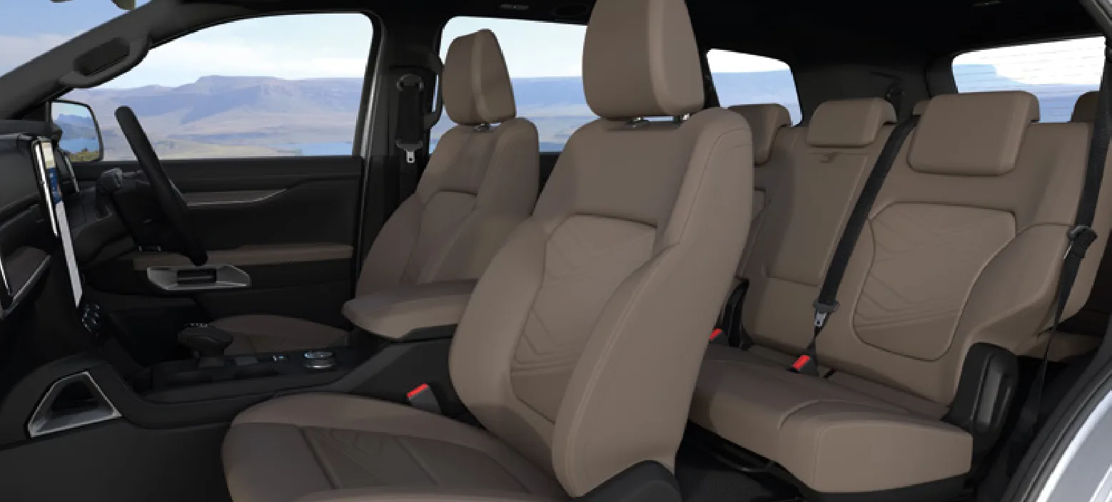 Seven leather-upholstered seats — three-row captain's-chair cabin