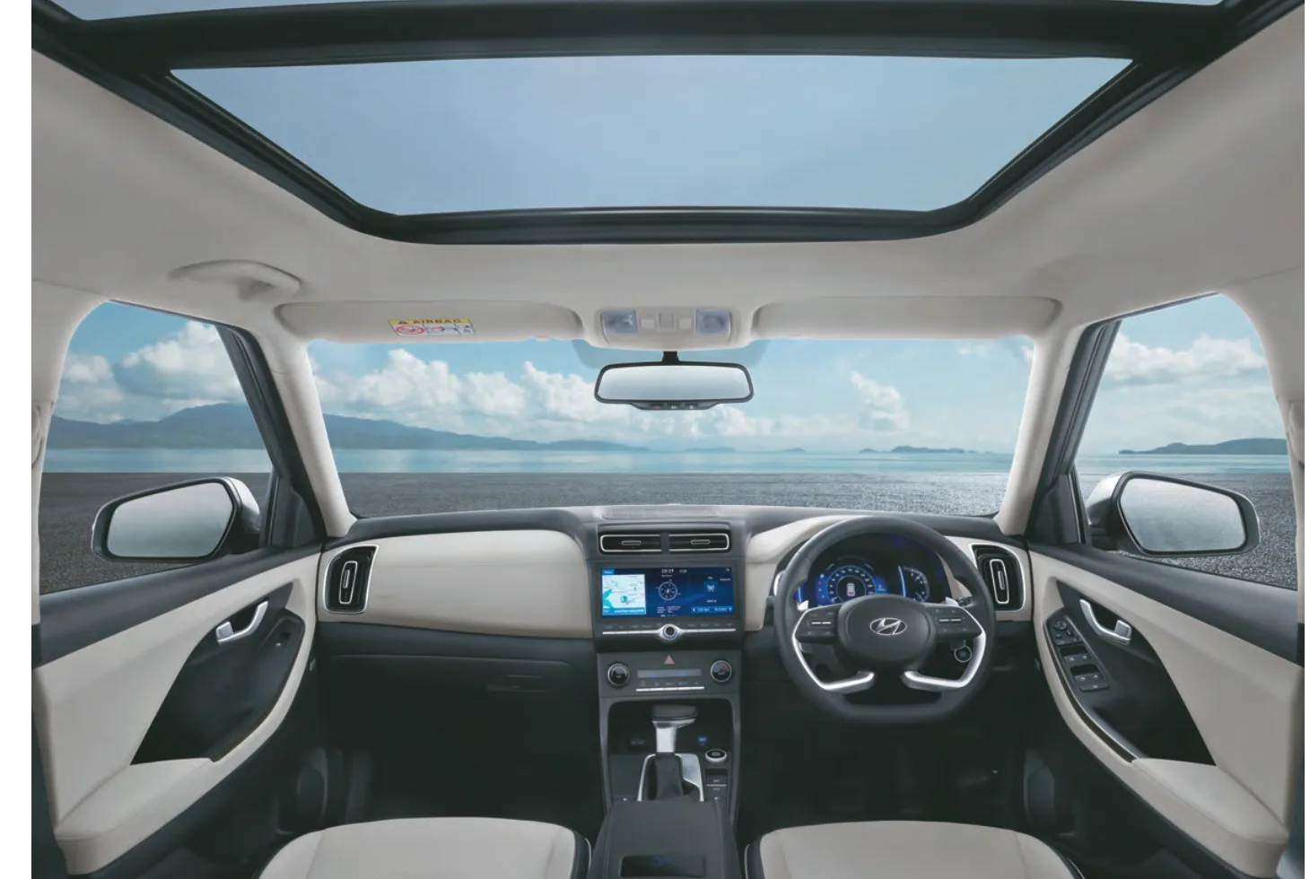 Cabin view — panoramic sunroof and dashboard