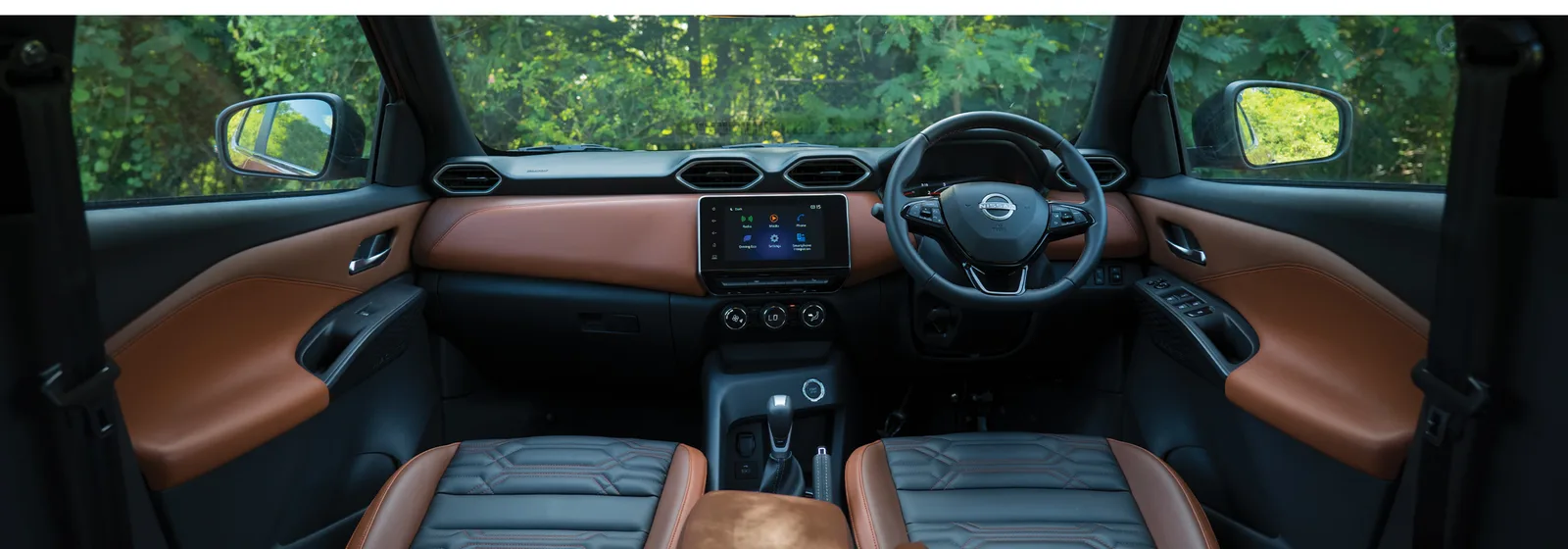 Cabin view — leather dashboard and quilted seats