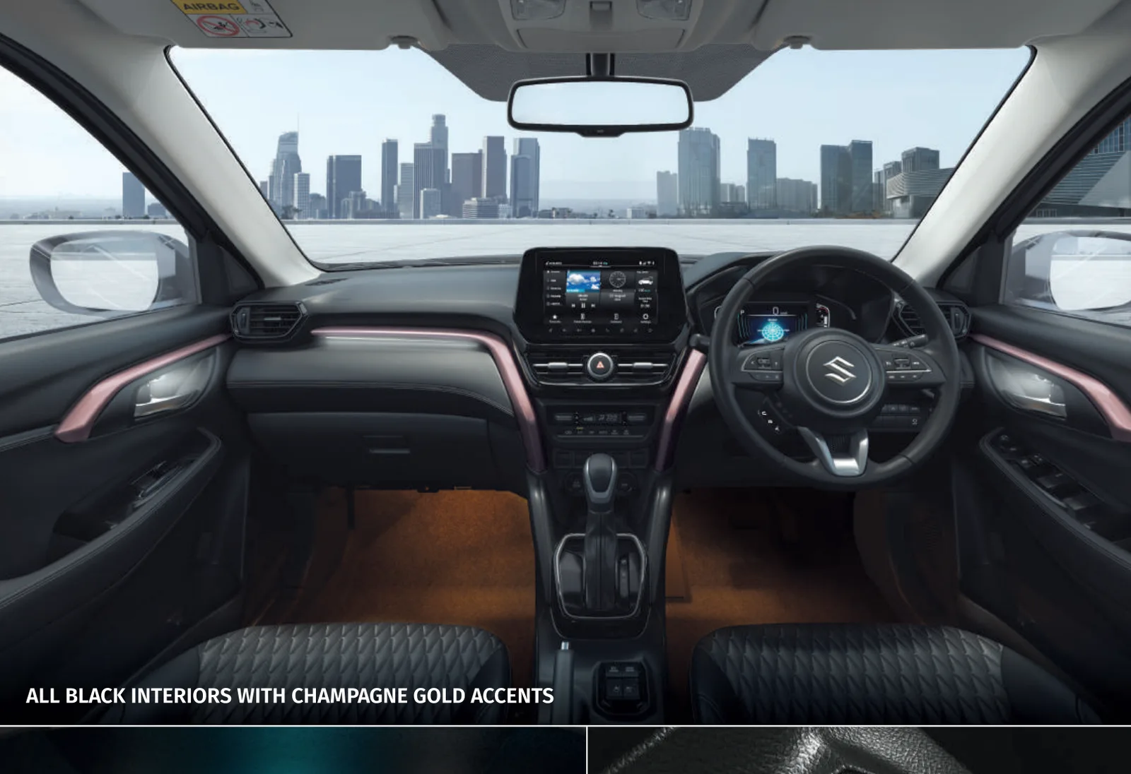 All black interiors with champagne gold accents and touchscreen infotainment
