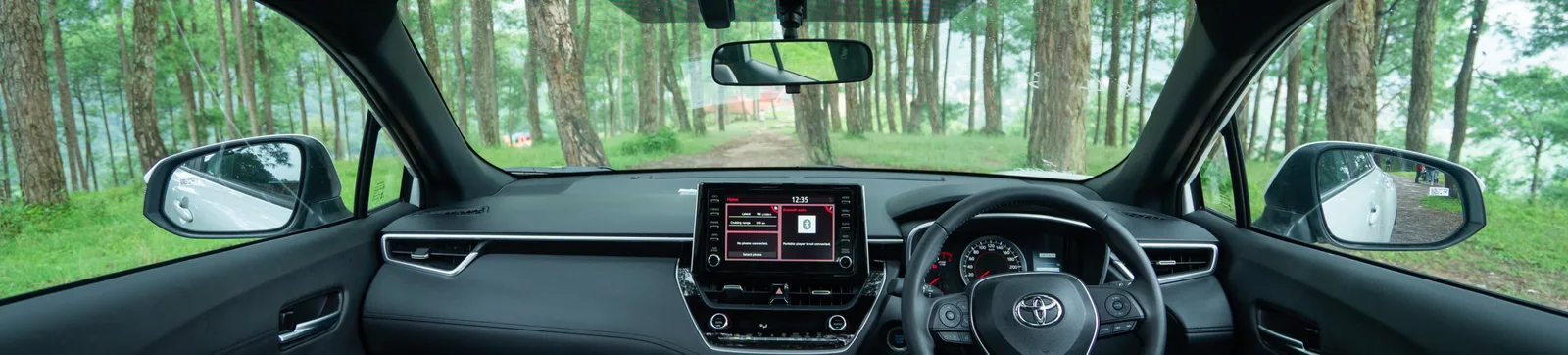 Refined interior — touchscreen infotainment and digital cluster