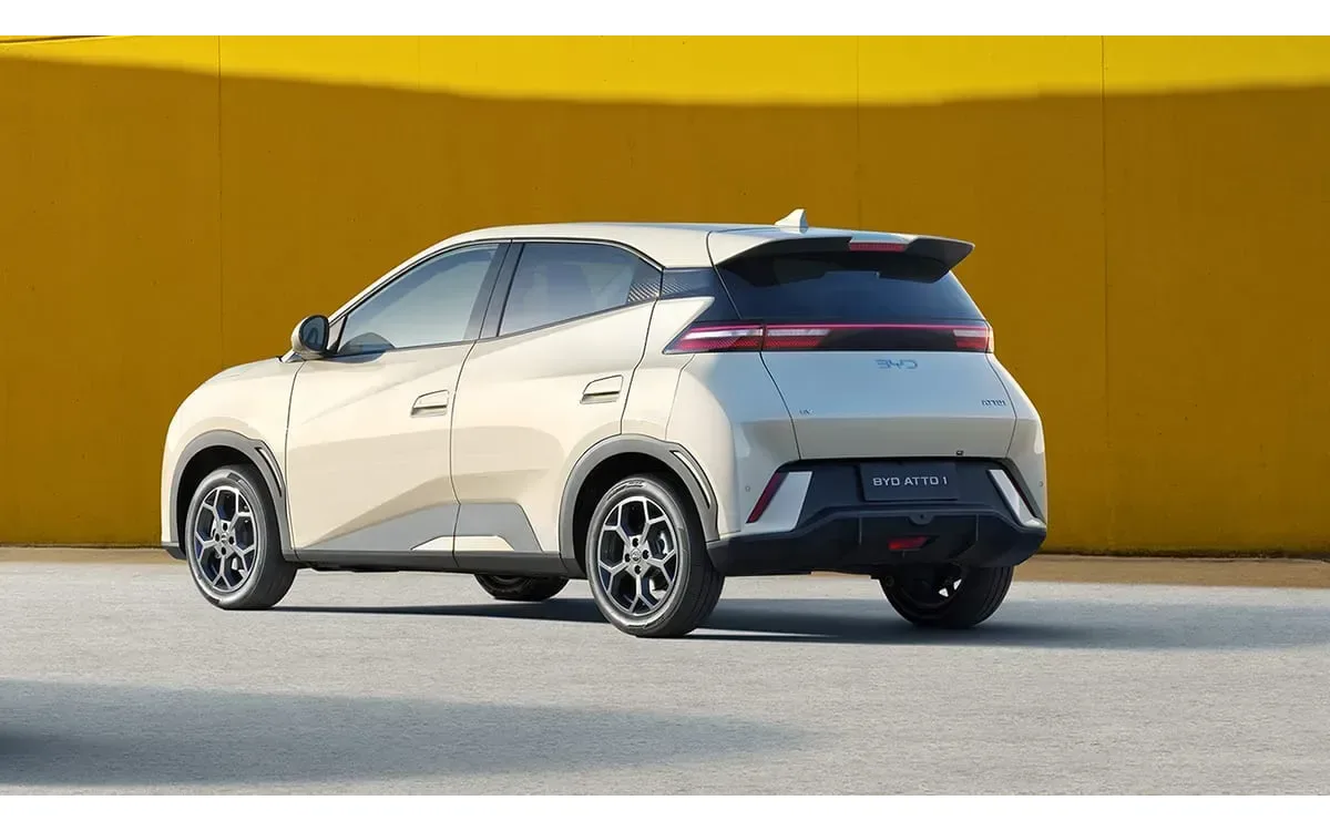 Rear three-quarter view, white hatchback