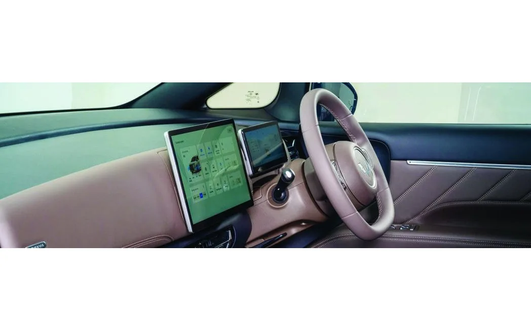 Dashboard with steering wheel and touchscreen